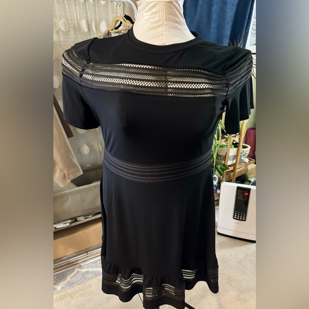 Michael Michael Kors Midi dress with lattice pattern.